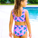 Biquíni modelo cropped infantil com alças largas e detalhe de laço no peito.