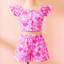 Blusa curta com fechamento simulado por botões de madeira rústicos