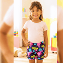 short tactel infantil azul marinho com estampa de bolas e círculos neon coloridos