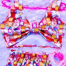 "Peça de moda praia infantil estilo 'mini diva' com personagem de desenho animado